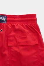 Vilebrequin Swim shorts 'Moorea Magic' red shown from the back close-up, made of high-quality microfibre that changes color in water, with elasticated waistband, drawstring, back pocket with hook-and-loop fastener, drainage eyelets, tonal turtle stitching