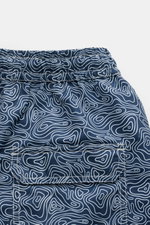 Close-up rear view of 04651/ A trip in a bag Swim shorts 'Seamap' navy/white patterned, showing elasticated waistband, back pocket with flap, and nautical chart pattern. Quick-drying microfibre, regular fit, side seam pockets, mesh lining, short hem vents