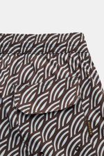 Close-up rear view of Moorer Swim shorts dark brown/smoky blue patterned, showing elasticated waistband with drawstring, back pocket with flap, quick-drying microfibre, smooth feel, regular fit, small key pocket inside, side seam pockets, and smooth linin