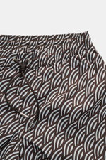 Close-up front view of Moorer Swim shorts dark brown/smoky blue patterned, featuring quick-drying microfibre, smooth feel, regular fit, elasticated waistband with drawstring, small key pocket inside, side seam pockets, back pocket with flap, and smooth li
