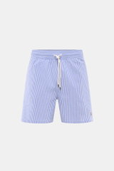 Polo Ralph Lauren Swim shorts 'Traveler' blue/white striped shown from front, featuring elastic waistband with drawstring. Stylish confidence for your travels: These POLO RALPH LAUREN swim shorts are the perfect companion for your next holiday in the sun.