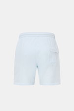 Rear view of 04651/ A trip in a bag Swim shorts 'Mono Seersucker' pastel blue with elastic waistband, back pocket with flap, and seersucker texture

Description: <p>Perfect for your next summer holiday: With their design in seersucker look, these swim sho