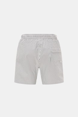 Rear view of 04651/ A trip in a bag Swim shorts navy/white striped featuring elasticated waistband, back pocket with flap, side vents, and seersucker fabric. 

<p>Perfect for your next summer holiday: With their modern striped pattern, these swim shorts b