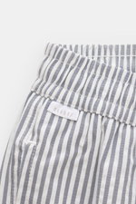 Close-up front-side view of 04651/ A trip in a bag Swim shorts navy/white striped with elastic waistband and side pocket.

<p>Perfect for your next summer holiday: With their modern striped pattern, these swim shorts by 04651/ A TRIP IN A BAG are an eye-c