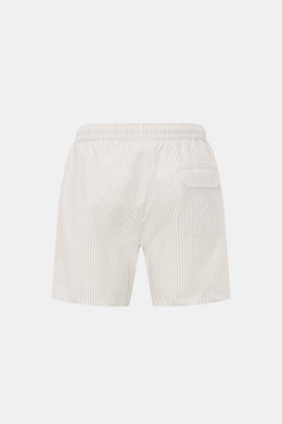 Rear view of 04651/ A trip in a bag Swim shorts light grey/white striped with elasticated waistband, side pockets, back pocket with flap, and side vents, made of seersucker cotton and microfiber, featuring a modern striped pattern and mesh lining, perfect