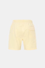 Rückansicht der 04651/ A trip in a bag Badeshorts pastellgelb/weiß gestreift aus leichtem Baumwoll-Seersucker mit elastischem Bund, Taschen und Mesh-Innenfutter.