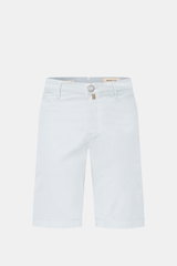 Front view of Jacob Cohen Bermudas 'Bob' pastel blue shorts, slim fit, low waist, elasticated cotton with soft feel, garment-dyed twill texture, button fly, French and back pockets with buttons, small watch pocket, and iconic leather patch. Summer as it s