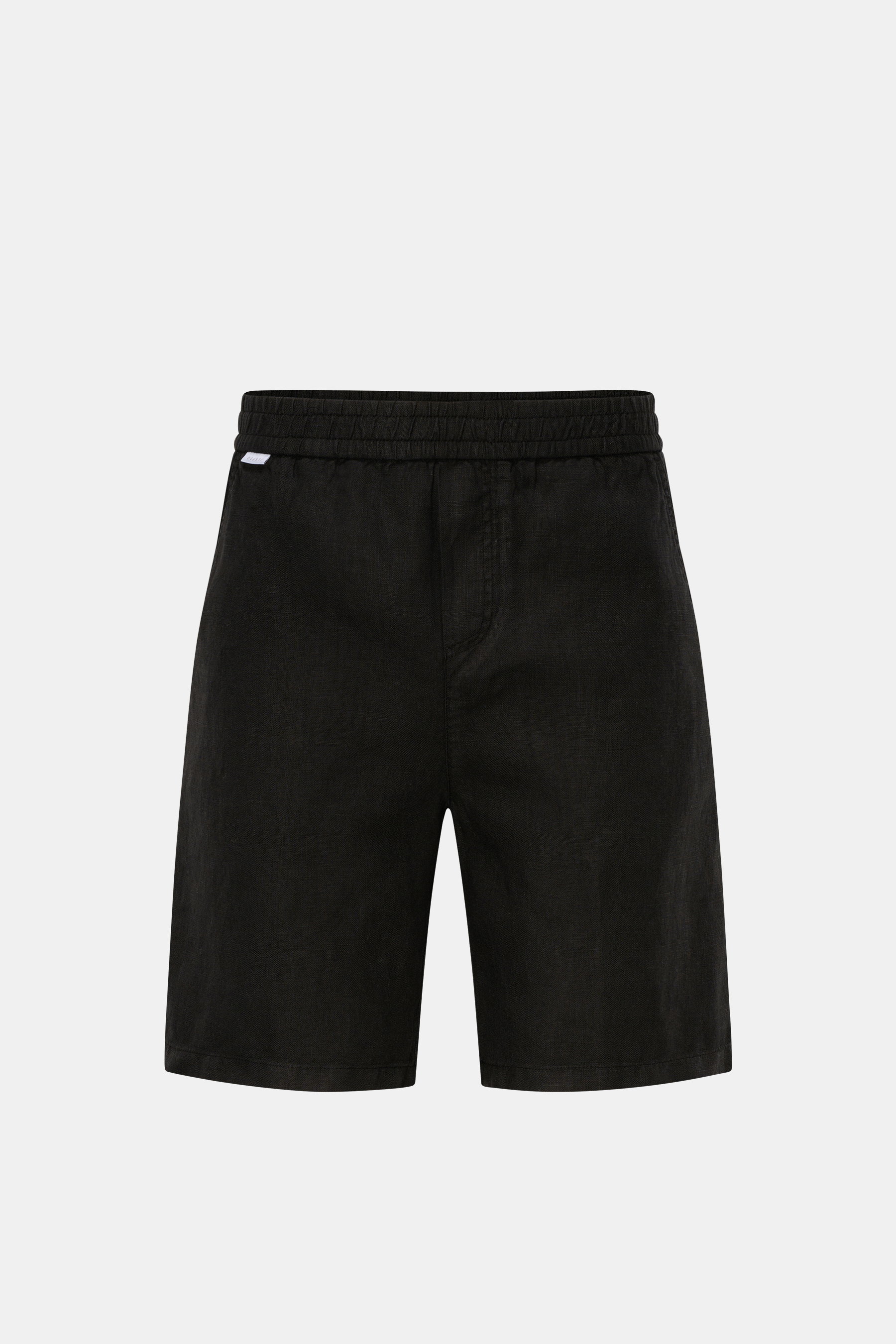Front view of 04651/ A trip in a bag Linen shorts black, made of airy linen fabric with elastic waistband, French pockets, and patch back pocket.

Description: <p>With this airy model, 04651/ A TRIP IN A BAG presents a comfortable pair of pure linen short