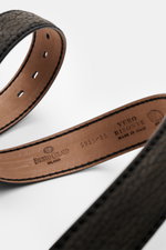 Close-up angled view of the Fausto Colato Gürtel Bisonleder dunkelbraun showing soft, grained bison leather, brass buckle, a loop, and Made in Italy label.