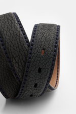 Close-up front-side view of Fausto Colato Gürtel Bisonleder graublau, a soft, gray-blue grained bison leather belt with brass buckle, single loop, Made in Italy, featuring detailed stitching and textured surface.