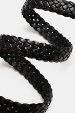 Close-up front view of Ami Paris Braided belt black, showing braided smooth leather texture in a spiral shape on white background. Timeless accessory: The braided belt from AMI PARIS proves to be a versatile essential for stylish outfits. Braided, smooth 