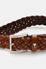Close-up front angle of Ami Paris Braided belt brown showing braided smooth leather, silver prong buckle, and logo pull-through loop, width approx. 3 cm. Timeless accessory: The braided belt from AMI PARIS proves to be a versatile essential for stylish ou