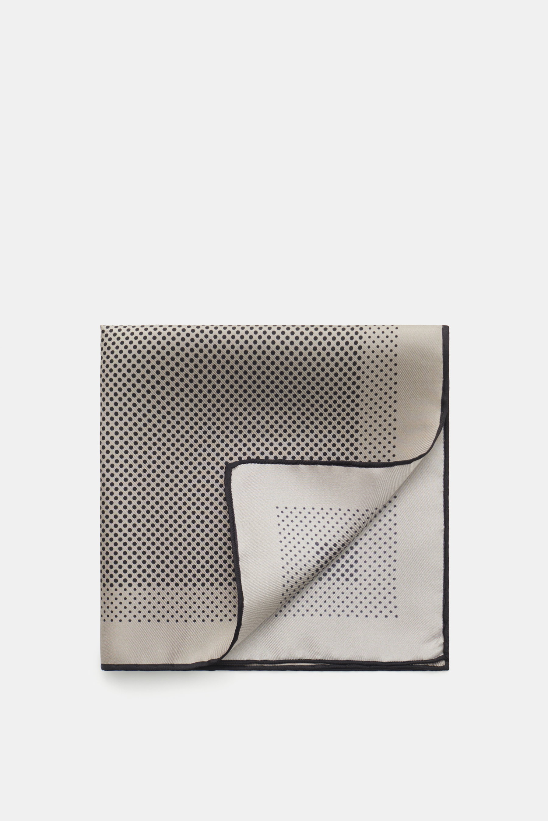 Tom Ford Einstecktuch grau/schwarz gepunktet, aus reiner Seide mit geschmeidigem Griff, modernes Punkte-Design, handrollierte Kanten, kleines TOM FORD-Logo, Made in Italy, Maße 40x40 cm, fotografiert von oben.