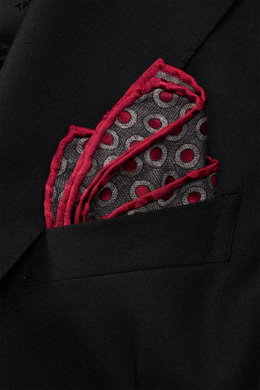 Close-up from above of a Brunello Cucinelli Silk Pocket Square dark grey/dark red dotted folded in a black jacket pocket.

Description: 
<p>Subtle elegance for style-conscious appearances: With this finely dotted pocket square, BRUNELLO CUCINELLI once aga