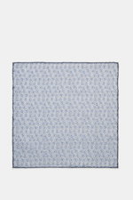 Brunello Cucinelli Silk Pocket Square smoky blue/grey blue dotted, flat lay top view, pure silk, smooth, dotted, rolled edges.

Subtle elegance for style-conscious appearances: With this finely dotted pocket square, BRUNELLO CUCINELLI once again emphasize