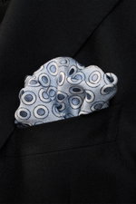 Close-up front view of a Brunello Cucinelli Silk Pocket Square smoky blue/grey blue dotted, finely dotted pure silk with rolled edges in a black jacket pocket.

Description:
<p>Subtle elegance for style-conscious appearances: With this finely dotted pocke