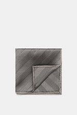 Brunello Cucinelli Silk Pocket Square taupe patterned, folded and photographed from above, with tonal woven pattern and rolled edges.