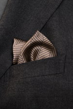 Close-up front view of a Brunello Cucinelli Silk Pocket Square Brown Patterned in a dark jacket pocket, showing its tonal woven pattern and rolled edges.

Description: <p>Subtle elegance for style-conscious appearances: With this noble pocket square in to