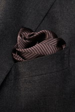 Close-up front view of Brunello Cucinelli Silk Pocket Square dark brown patterned in a suit pocket with tonal woven pattern and rolled edges.

<p>Subtle elegance for style-conscious appearances: With this noble pocket square in tonal woven pattern, BRUNEL