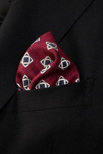 Close-up front angle of Brunello Cucinelli Silk Pocket Square navy/burgundy patterned with ornamental design in a black blazer pocket.

Description: 
<p>Elegant accent: The silk pocket square from BRUNELLO CUCINELLI with its distinctive ornamental pattern