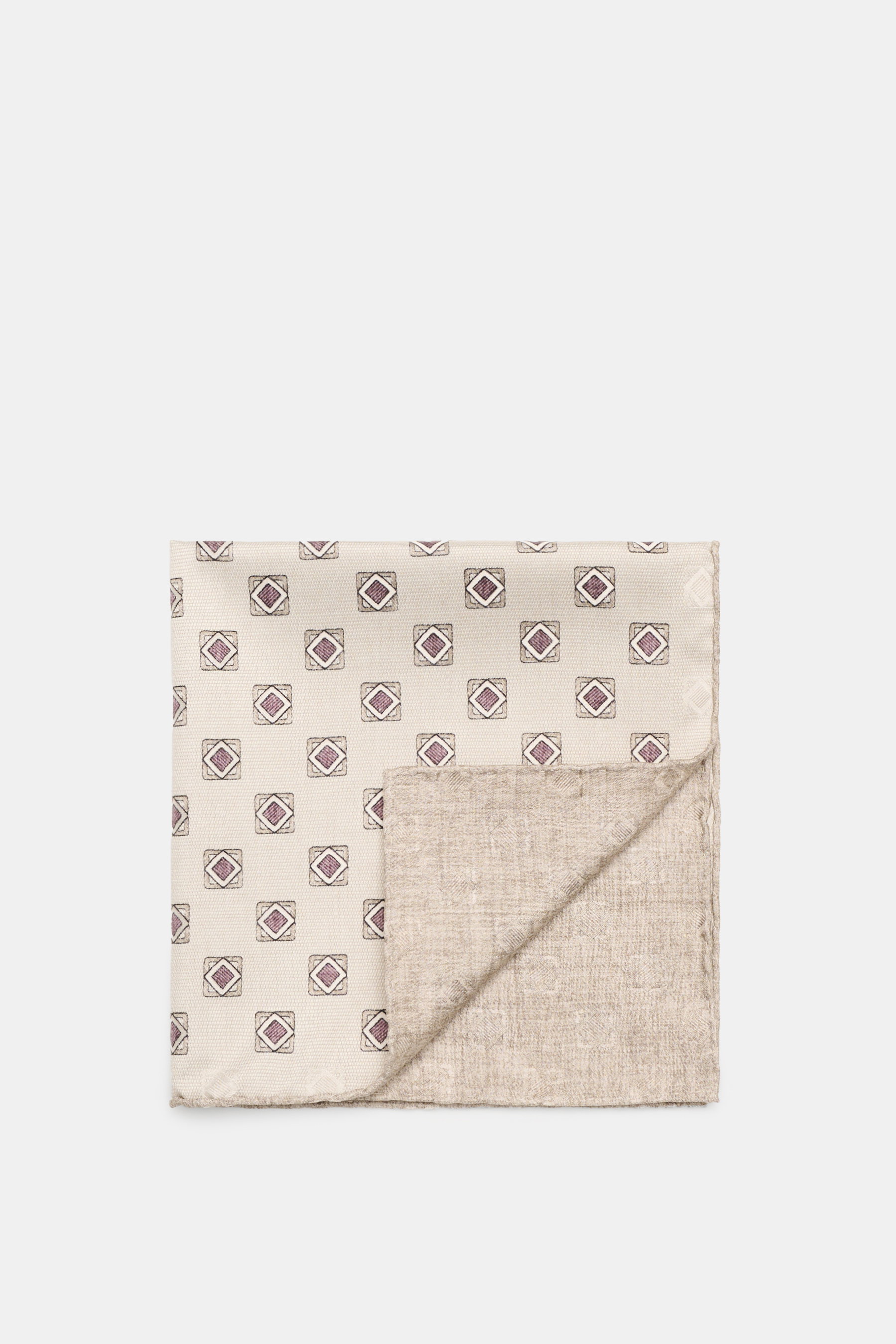 Top-down view of Brunello Cucinelli Silk Pocket Square sand/beige patterned with ornamental design, rolled edges, and smooth pure silk texture.

<p>Elegant accent: The silk pocket square from BRUNELLO CUCINELLI with its distinctive ornamental pattern is a