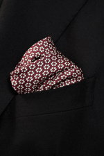Brunello Cucinelli Silk pocket square dark red/dark grey pattern folded in black jacket pocket, close-up front angle view, pure silk, smooth feel, graphic micro print, rolled edges, Made in Italy, approx. 35 cm x 35 cm.