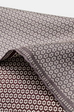 Brunello Cucinelli Silk pocket square grey/burgundy pattern shown from a close-up side angle with rolled edges, pure silk, smooth feel, graphic micro print, Made in Italy, approx. 35 cm x 35 cm.