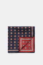 Folded Brunello Cucinelli Silk pocket square navy/reddish brown patterned with medallion design, smooth pure silk, rolled edges, top-down view.

<p>Noble accent: The silk pocket square by BRUNELLO CUCINELLI features a subtle medallion pattern that adds a 