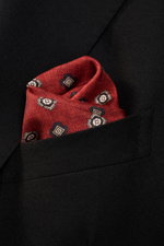 Close-up front view of Brunello Cucinelli Silk pocket square navy/reddish brown patterned folded in a black blazer pocket with medallion design.

Description: 
<p>Noble accent: The silk pocket square by BRUNELLO CUCINELLI features a subtle medallion patte