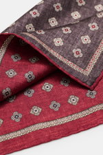 Brunello Cucinelli Silk pocket square dark red/dark grey patterned, close-up from above showing medallion pattern and rolled edges, pure silk.