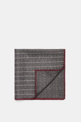 Brunello Cucinelli Silk pocket square dark grey/light grey/burgundy striped, folded, photographed from top down, pure silk, smooth feel.

Timeless refinement for sophisticated looks: The silk pocket square by BRUNELLO CUCINELLI features an elegant striped