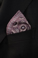 Close-up front view of Brunello Cucinelli Silk Pocket Square purple/navy patterned with medallion design in black blazer pocket.

Additional description:  
<p>Noble accent: The silk pocket square by BRUNELLO CUCINELLI features a subtle medallion pattern t