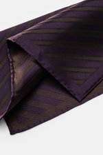 Close-up angled view of Brunello Cucinelli Silk Pocket Square Dark Violet/Brown Striped with diagonal stripes, rolled edges, and smooth pure silk texture.

Description:  
<p>Subtle elegance for stylish appearances: With this noble pocket square in a subdu