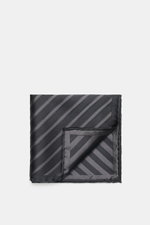 Folded Brunello Cucinelli Silk Pocket Square grey brown/brown striped shown from top-down, featuring diagonal stripes and rolled edges.

Description: <p>Subtle elegance for stylish appearances: With this noble pocket square in a subdued striped pattern, B