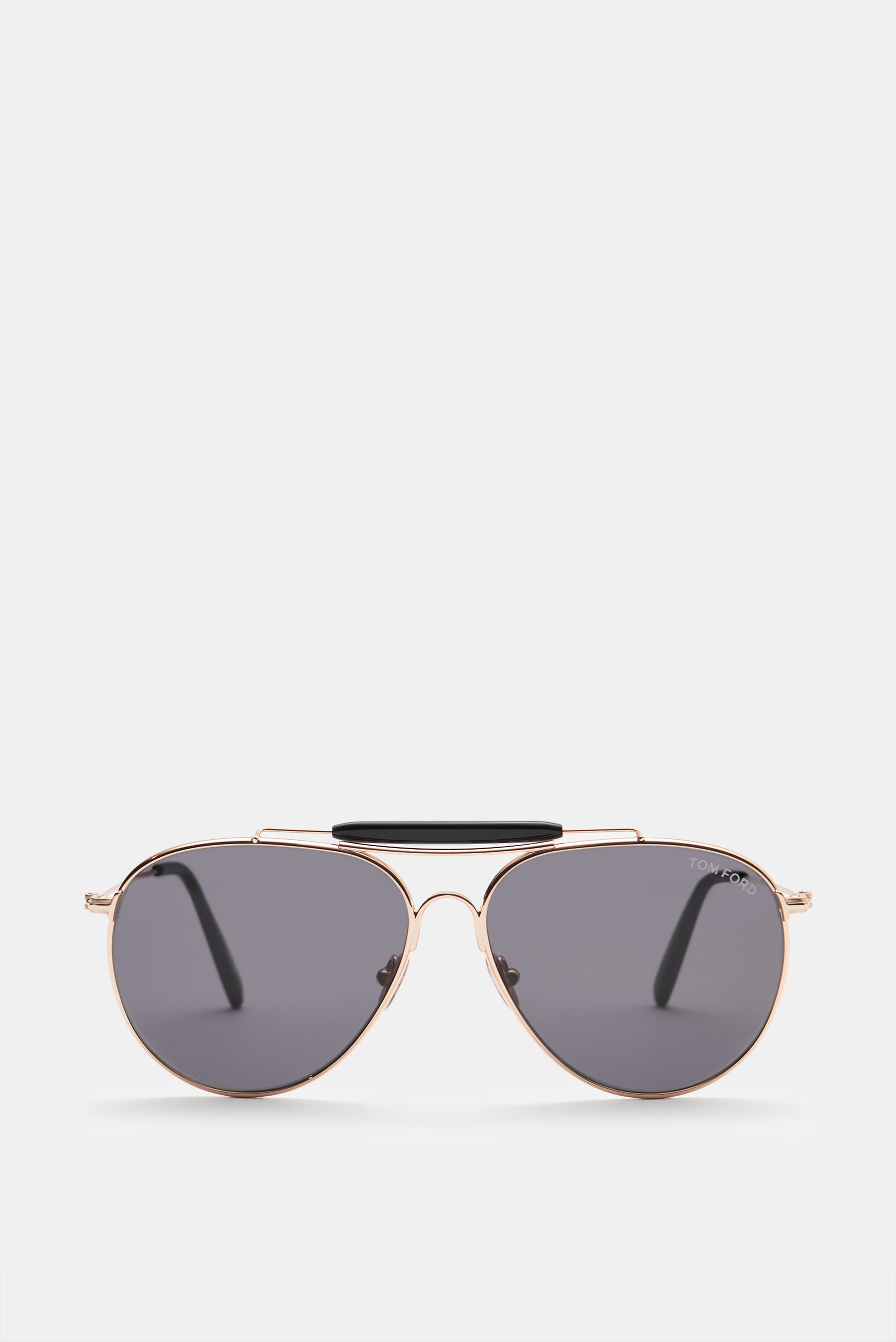 Tom Ford Sonnenbrille 'Rafael' gold/dunkelgrau im typischen Aviator-Stil, filigraner Metallrahmen, verspiegelte Verlaufsgläser, frontale Nahaufnahme.