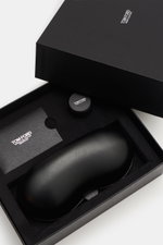 Top view of Tom Ford Horn glasses 'Private Collection' brown patterned packaging including leather hard case, service kit, and horn polish set.