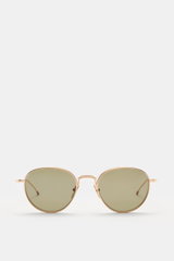 Thom Browne Sonnenbrille gold, frontale Ansicht, runde Form, tiefer Metallrahmen, gleichmäßig getönte Gläser, Tricolore-Detail am Bügel, 100% UV-Schutz.