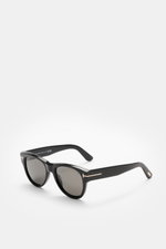 Tom Ford Sonnenbrille 'Burton' schwarz, leicht gerundete Silhouette, Acetat-Rahmen, getönte Gläser, 100% UV-Schutz, seitliche Nahaufnahme, weißer Hintergrund.