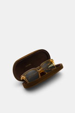 Tom Ford Sonnenbrille 'Dax' gelb/grün im geöffneten braunen Samt-Etui, leicht eckige Form, polarisierte Kunststoffgläser, 100% UV-Schutz, Frontansicht.