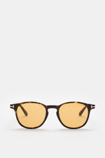 Tom Ford Sonnenbrille 'Holt' dunkelbraun meliert/gelb, frontale Nahaufnahme, leicht gerundete Silhouette, melierte Acetat-Fassung, gelbe Kunststoffgläser, UV-Schutz.