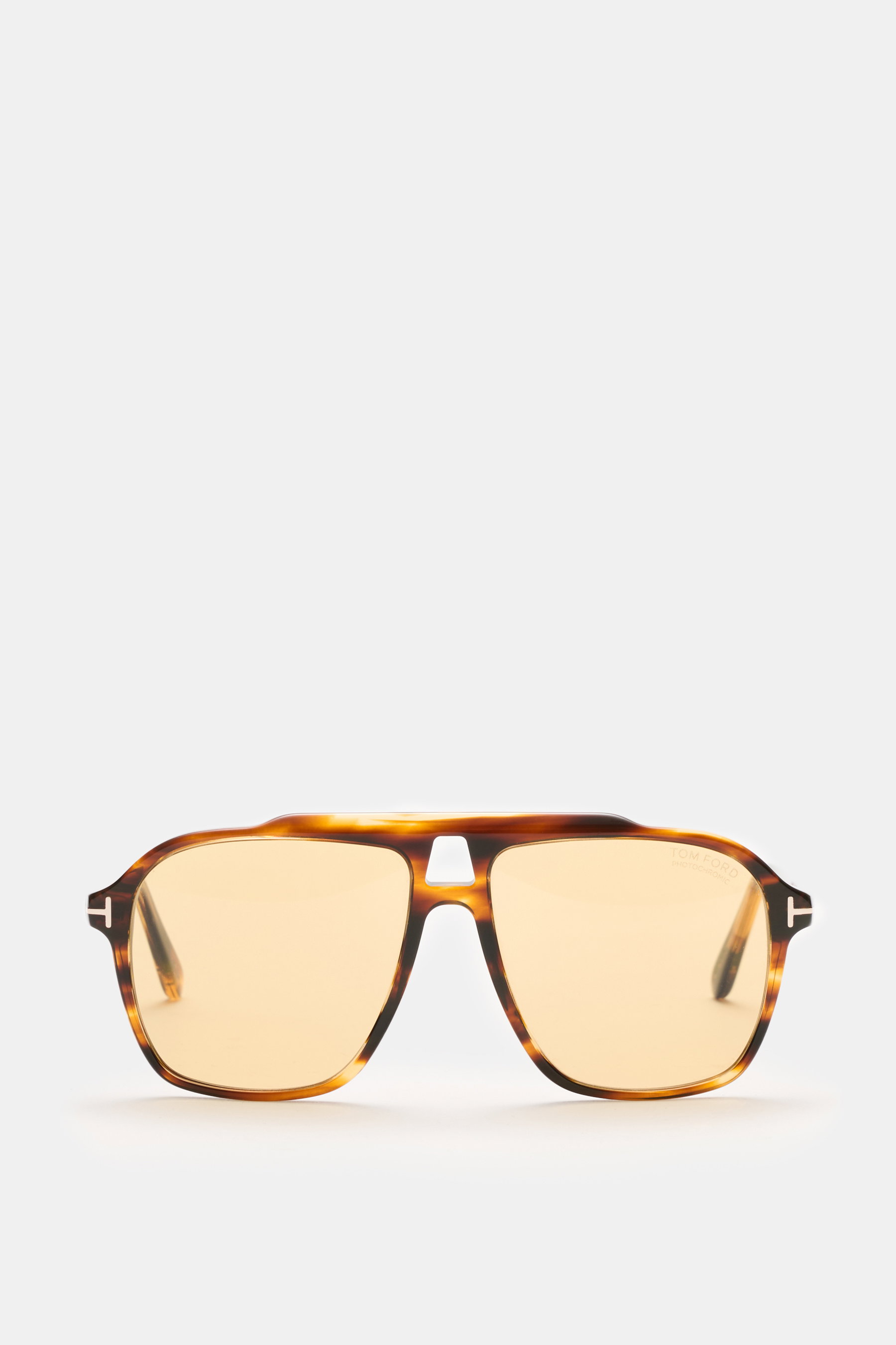 Tom Ford Sonnenbrille 'Autari' dunkelbraun meliert im klassischen Aviator-Stil mit photochromen Kunststoffgläsern frontal fotografiert.
