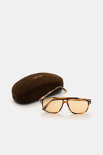 Tom Ford Sonnenbrille 'Autari' dunkelbraun meliert im klassischen Aviator-Stil mit photochromen Kunststoffgläsern und Acetat-Rahmen, frontal fotografiert, inklusive Samt-Etui.