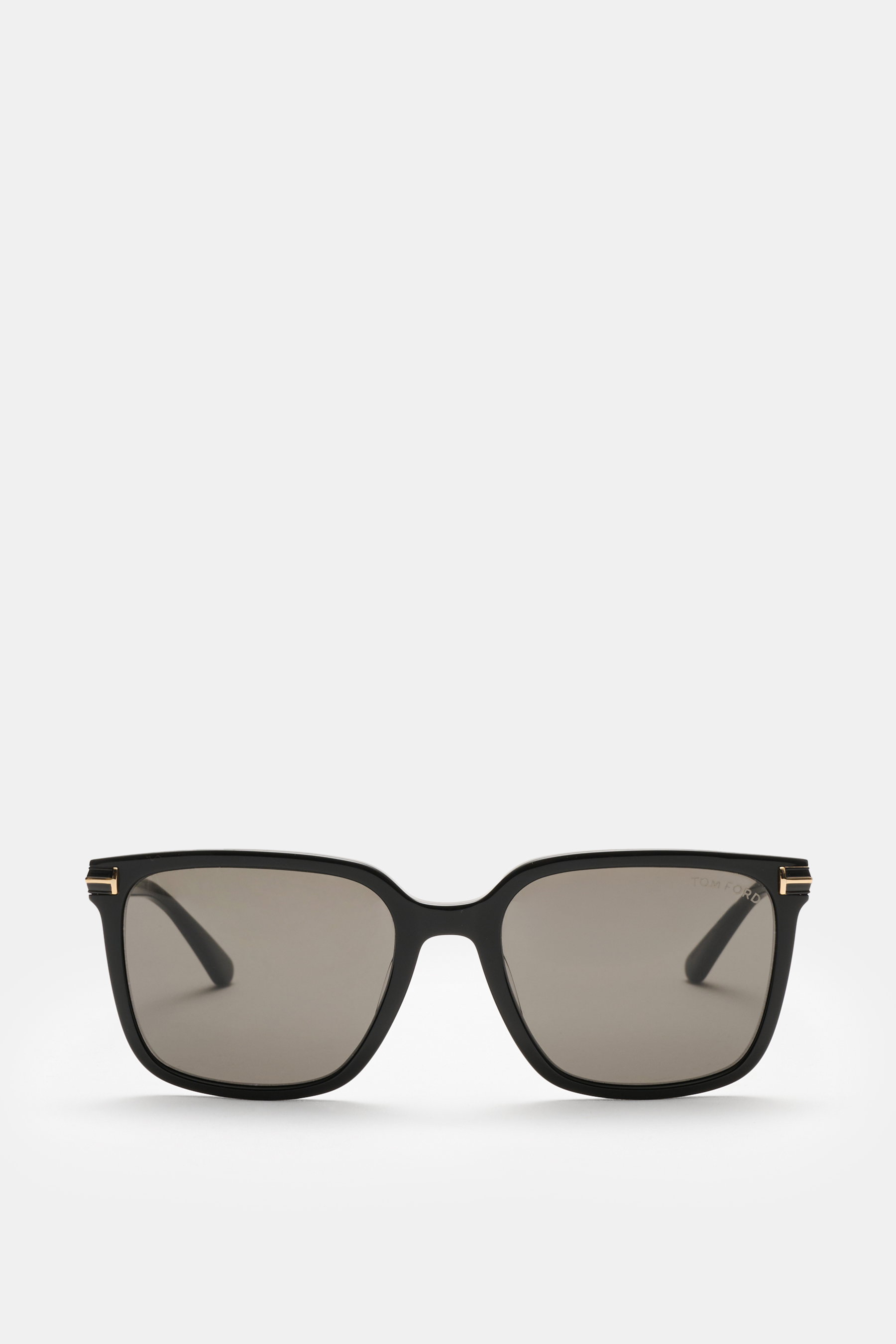 Tom Ford Sonnenbrille 'Jochem' schwarz, frontal fotografiert, leicht eckige Form, Acetat-Rahmen, getönte Kunststoffgläser, UV-Schutz, inkl. Samt-Etui.