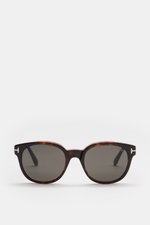 Tom Ford Sonnenbrille 'Mert' dunkelbraun meliert, frontale Nahaufnahme, leicht gerundete Silhouette, melierter Acetat-Rahmen, getönte Kunststoffgläser, UV-Schutz.
