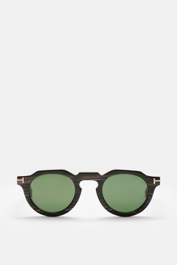 Tom Ford Horn-Sonnenbrille 'Private Collection' schwarz/grau/weiß gemustert, runder Retro-Look, Büffelhornrahmen, grüne Gläser, Frontansicht.