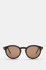 Tom Ford Sonnenbrille 'Private Collection' schwarz/grau gemustert, frontale Perspektive, leicht gerundete Silhouette, Kunststoffgläser, Acetat-Rahmen, UV-Schutz, Samt-Etui.