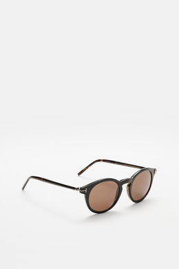 Tom Ford Sonnenbrille 'Private Collection' schwarz/grau gemustert, leicht gerundete Silhouette, Acetat-Rahmen, braune Kunststoffgläser, seitliche Perspektive.