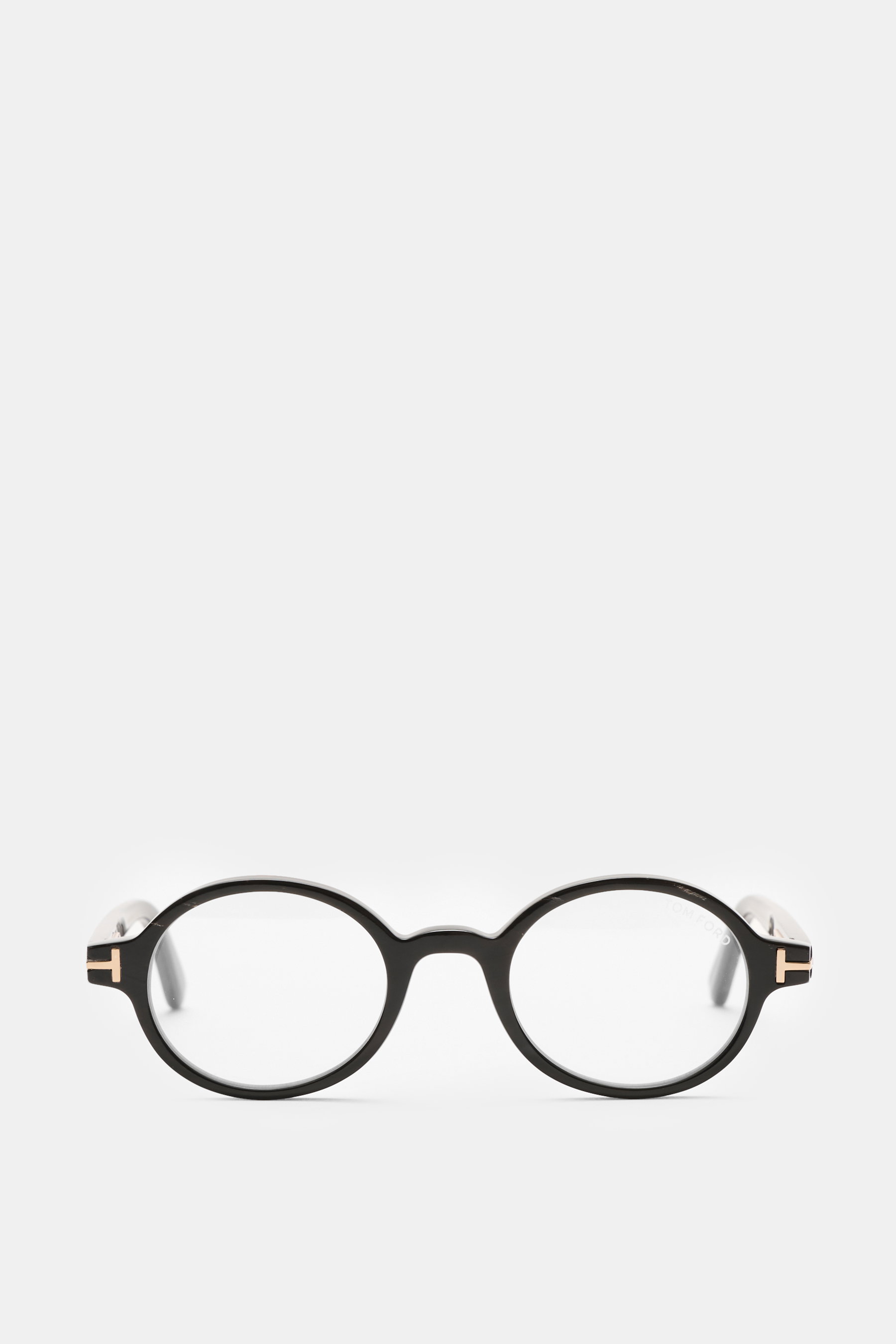 Tom Ford Horn Brille 'Private Collection' schwarz/grau gemustert, runde Form, Hornrahmen, Blaulichtfilter, T-Form Details, frontal fotografiert.