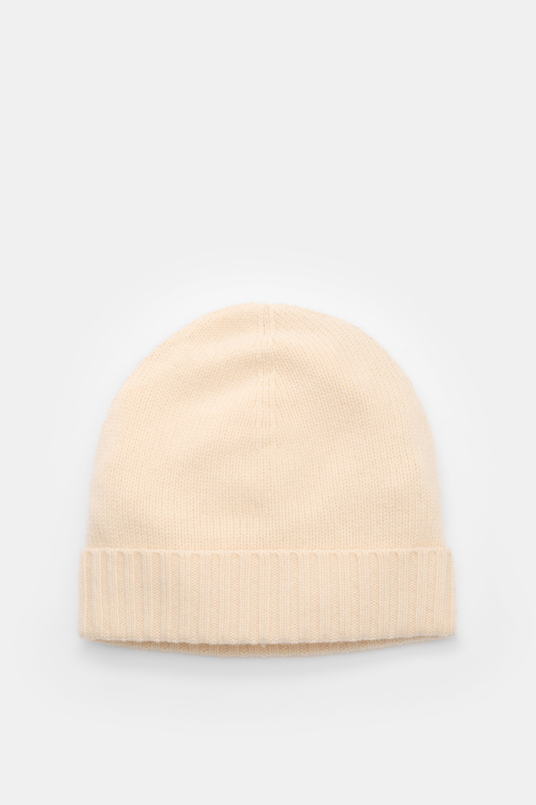 Top view of von Braun Cashmere beanie cream, a soft, finely knitted pure cashmere beanie with a small turn-up, perfect for casual or elegant winter wear.
