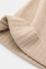 Close-up front view of von Braun Cashmere beanie sand showing fine knit, small turn-up, and soft pure cashmere texture.